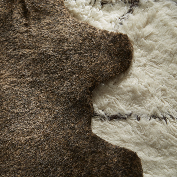 Beige and Brown Faux Cowhide Stain-Resistant Rug
