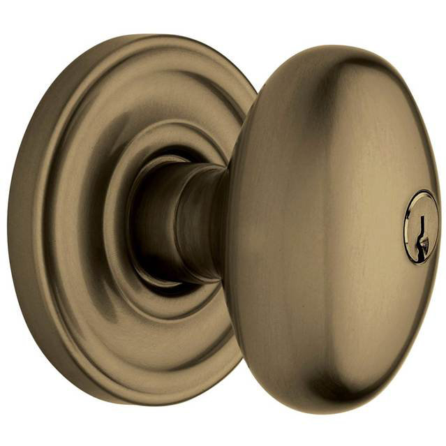Antique Brass Egg Knob Entry Door Set with Round Rosette