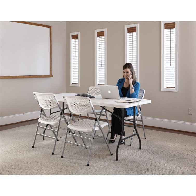 White Metal and Plastic Armless Folding Chair