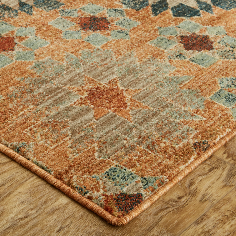 Saffron Orange and Turquoise Floral Synthetic Area Rug