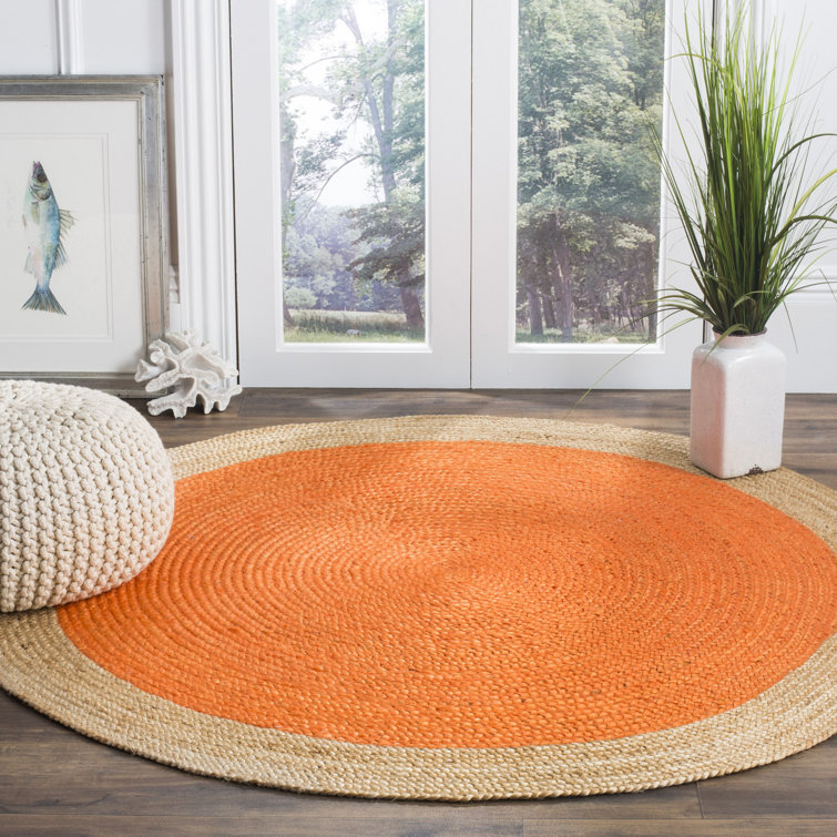 Handmade Round Orange and Natural Jute Braided Rug, 4' Diameter