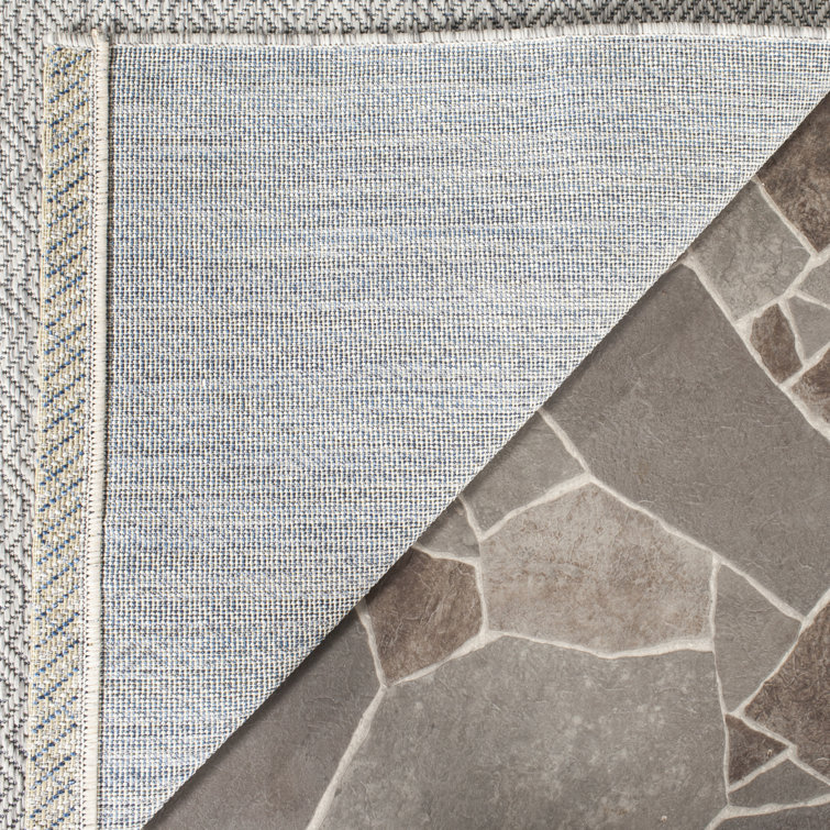 Delano Monochrome Gray Synthetic 6'7" x 9'6" Indoor/Outdoor Rug