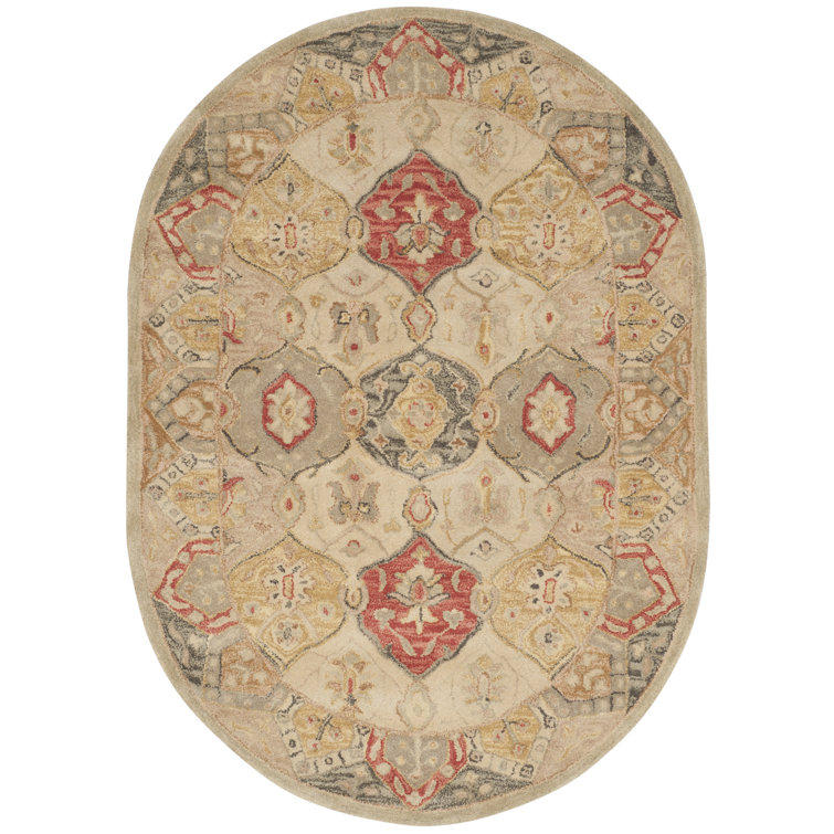 Antiquity Handmade Oval Red Wool Area Rug