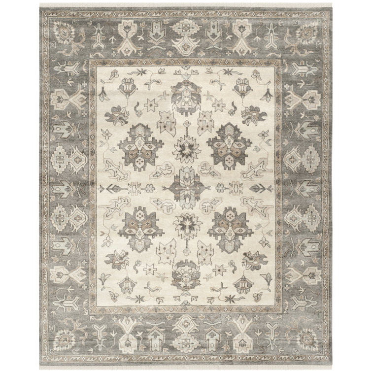 Handmade Ivory Wool 9' x 12' Rectangular Area Rug