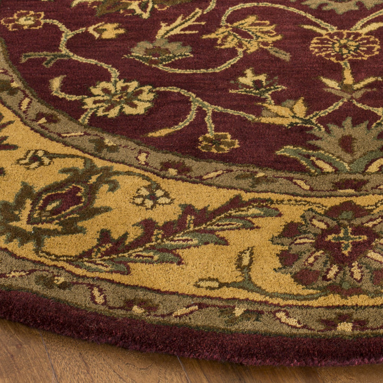 Handmade Round Burgundy and Gold Wool Area Rug