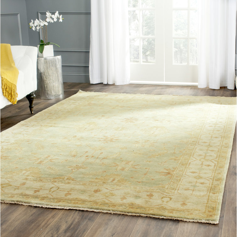 Elegant Oushak Ivory Wool 6' x 9' Hand-Knotted Area Rug