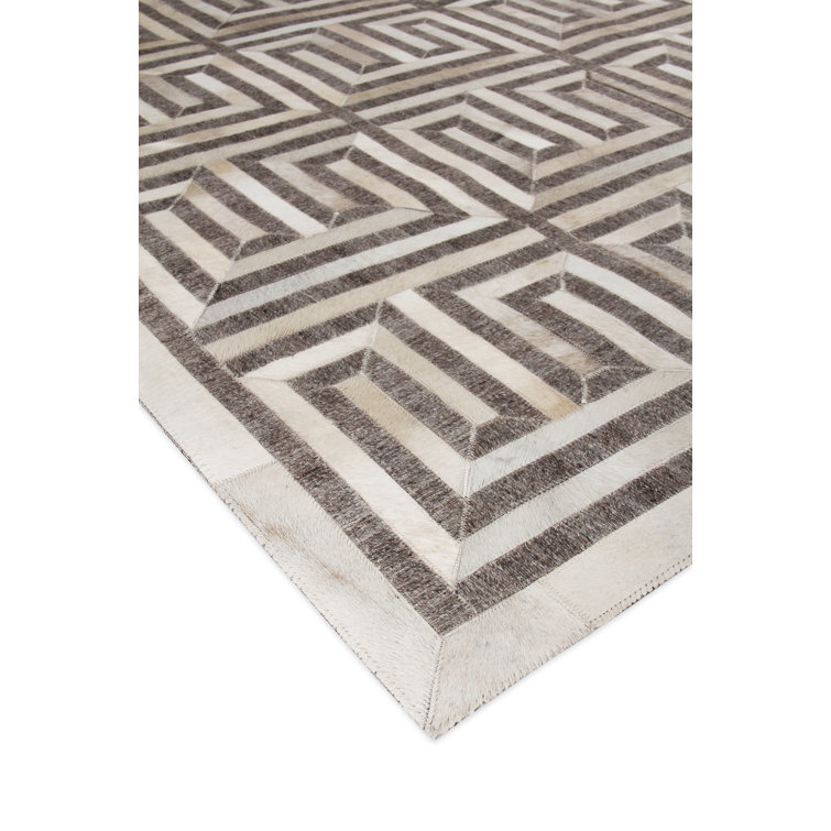 Ivory and Brown Geometric Handmade Viscose Cowhide Rug
