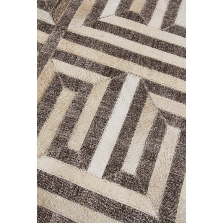 Ivory and Brown Geometric Handmade Viscose Cowhide Rug
