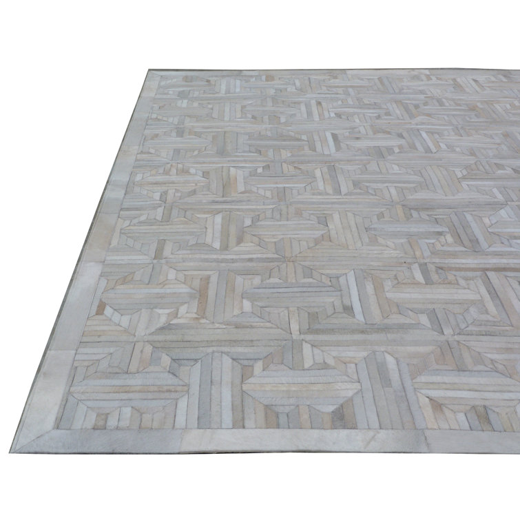 Ivory Geometric Handmade Cowhide Rectangular Rug 5' x 8'