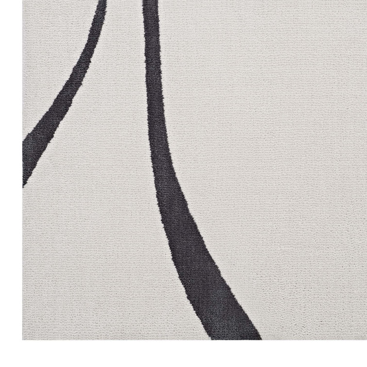 Ivory and Charcoal Abstract Swirl 5' x 8' Synthetic Area Rug