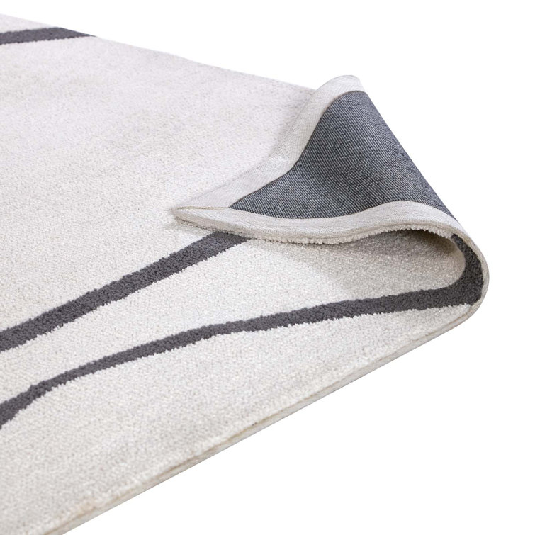Ivory and Charcoal Abstract Swirl 5' x 8' Synthetic Area Rug