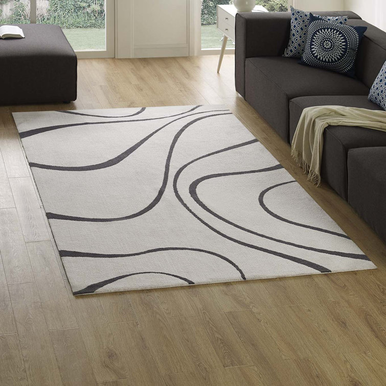 Ivory and Charcoal Abstract Swirl 5' x 8' Synthetic Area Rug