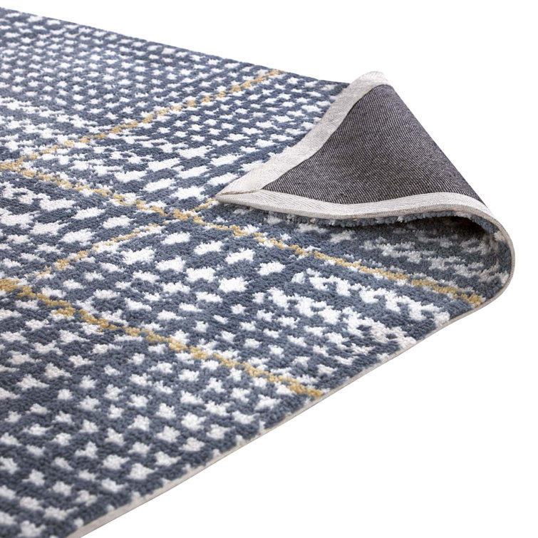 Kaja Black and White Synthetic Abstract Plaid Area Rug