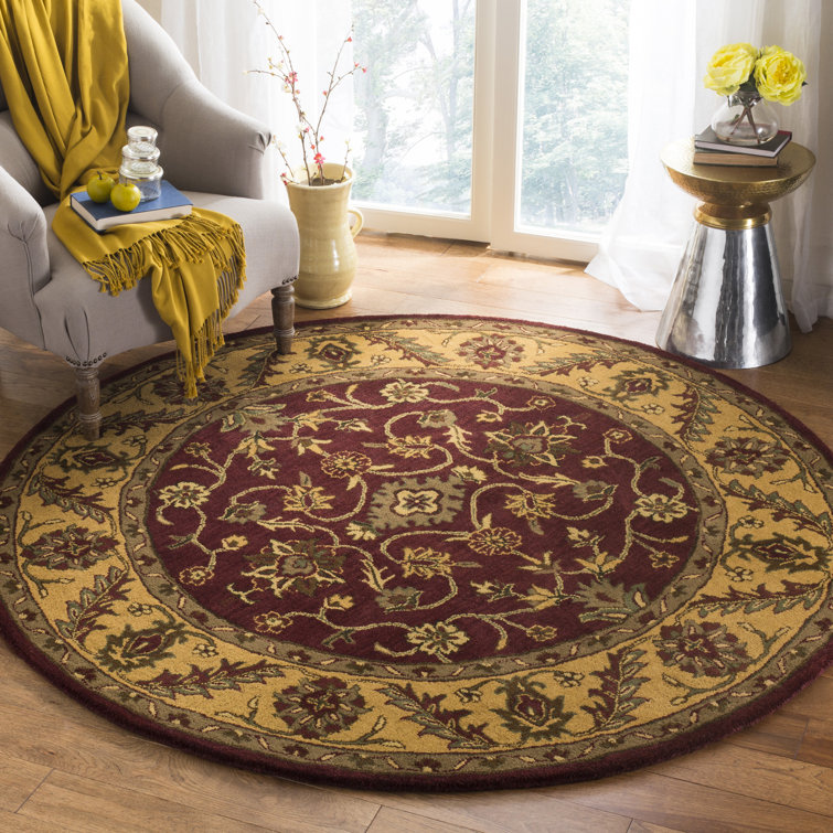 Handmade Round Burgundy and Gold Wool Area Rug
