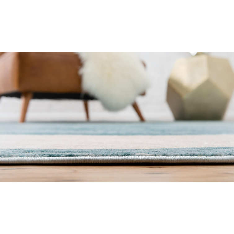 Turquoise and Ivory Rectangular Synthetic Area Rug