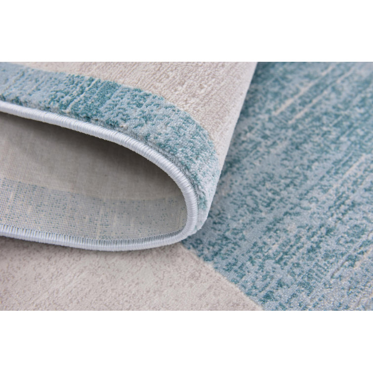Turquoise and Ivory Rectangular Synthetic Area Rug