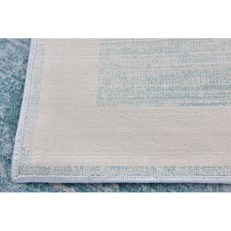 Turquoise and Ivory Rectangular Synthetic Area Rug