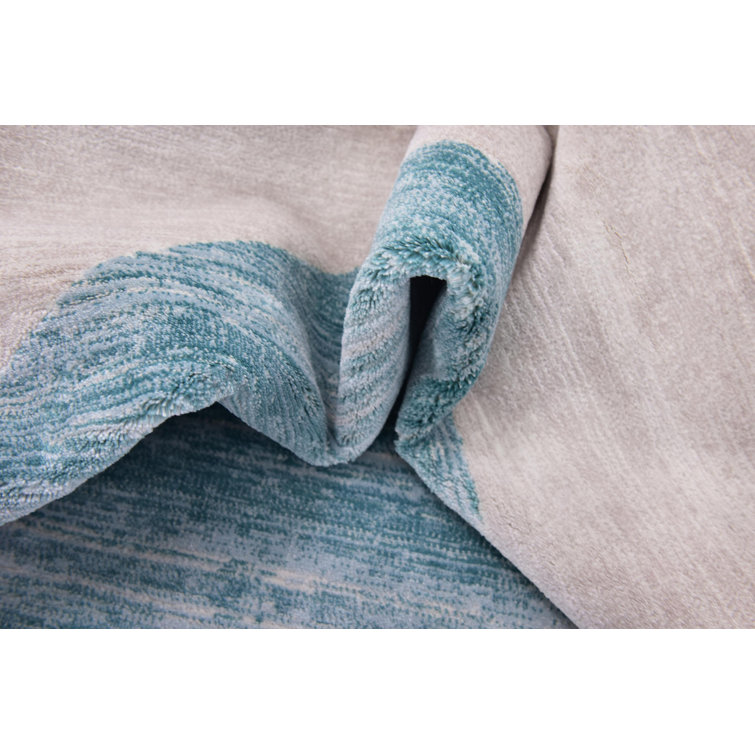 Turquoise and Ivory Rectangular Synthetic Area Rug