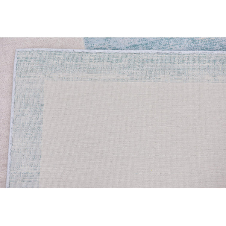 Turquoise and Ivory Rectangular Synthetic Area Rug