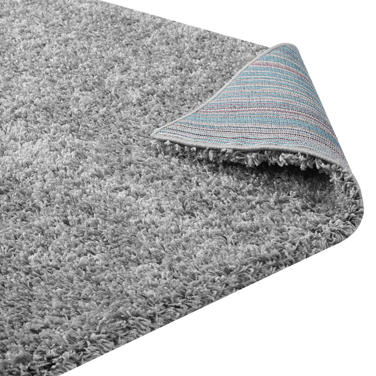 Enyssa Navy Solid Shag Synthetic Area Rug 5' x 8'