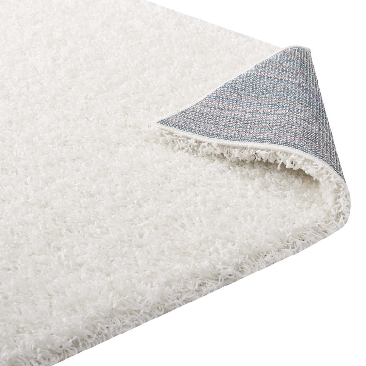 Enyssa Navy Solid Shag Synthetic Area Rug 5' x 8'