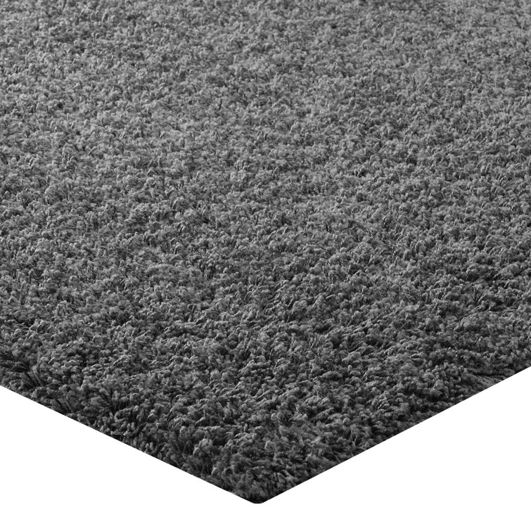Enyssa Navy Solid Shag Synthetic Area Rug 5' x 8'