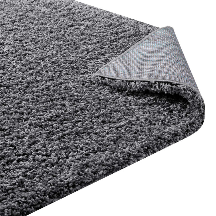 Enyssa Navy Solid Shag Synthetic Area Rug 5' x 8'