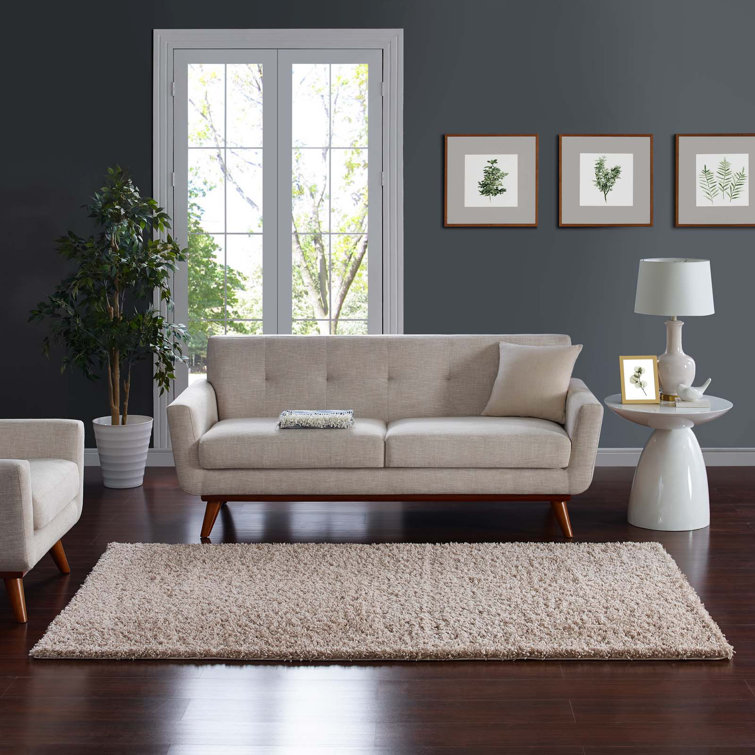 Enyssa Navy Solid Shag Synthetic Area Rug 5' x 8'