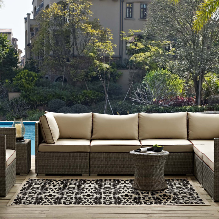 Ariana Black and Beige Floral Synthetic Area Rug