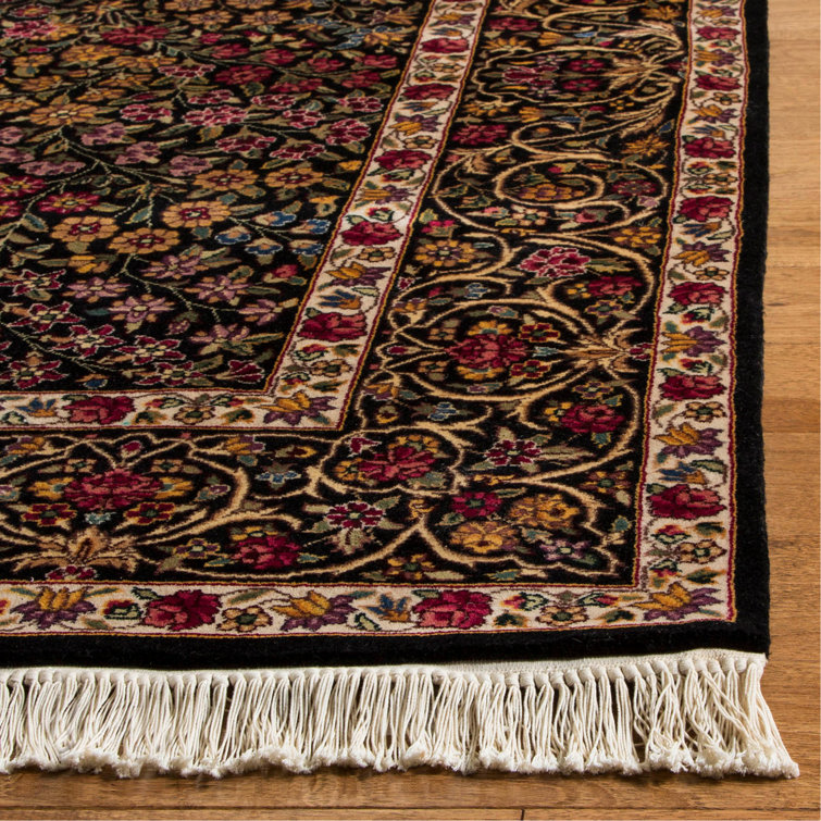 Handmade Ivory and Black Floral Wool Area Rug, 6' x 9'