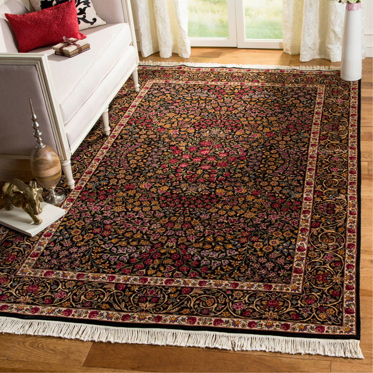 Handmade Ivory and Black Floral Wool Area Rug, 6' x 9'