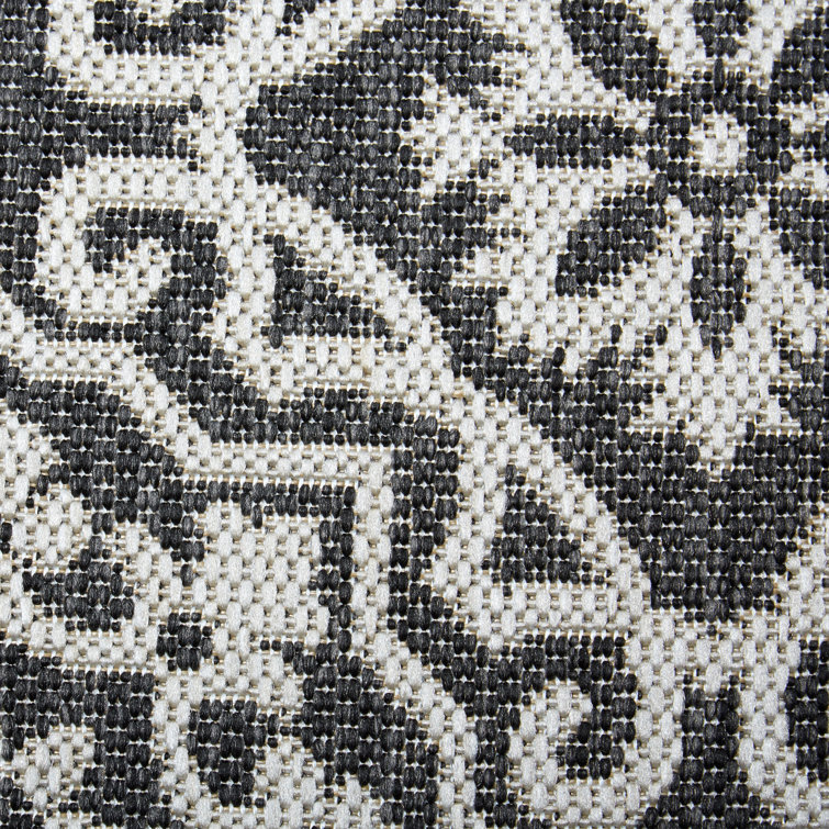 Danica 5'2" x 7'2" Black/Gray Synthetic Medallion Area Rug