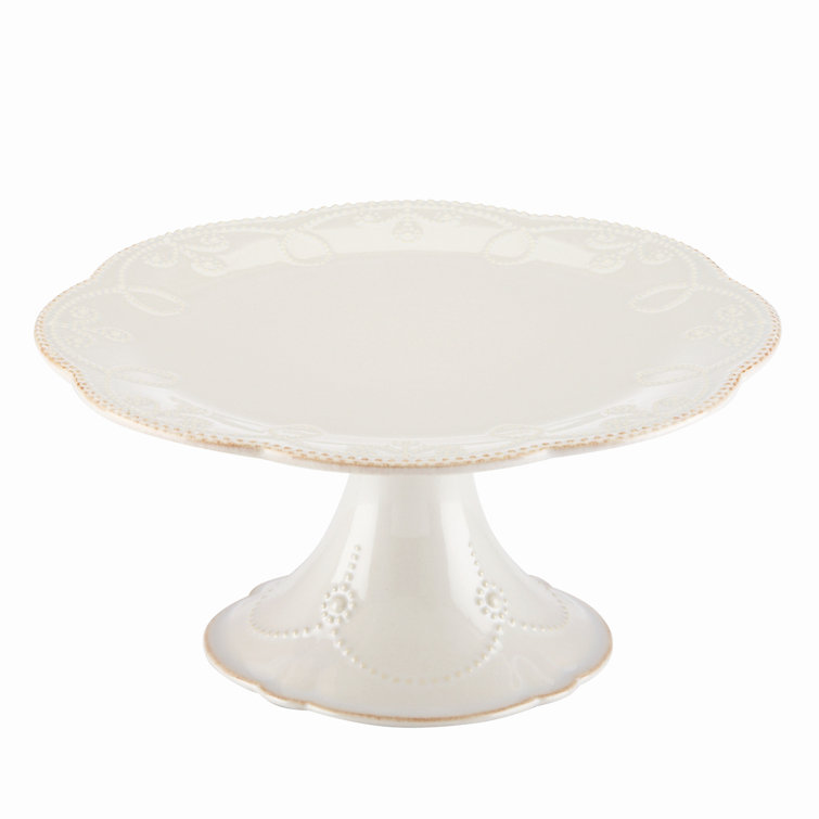 Elegant White Ceramic Pedestal Cake Stand with Floral Motif