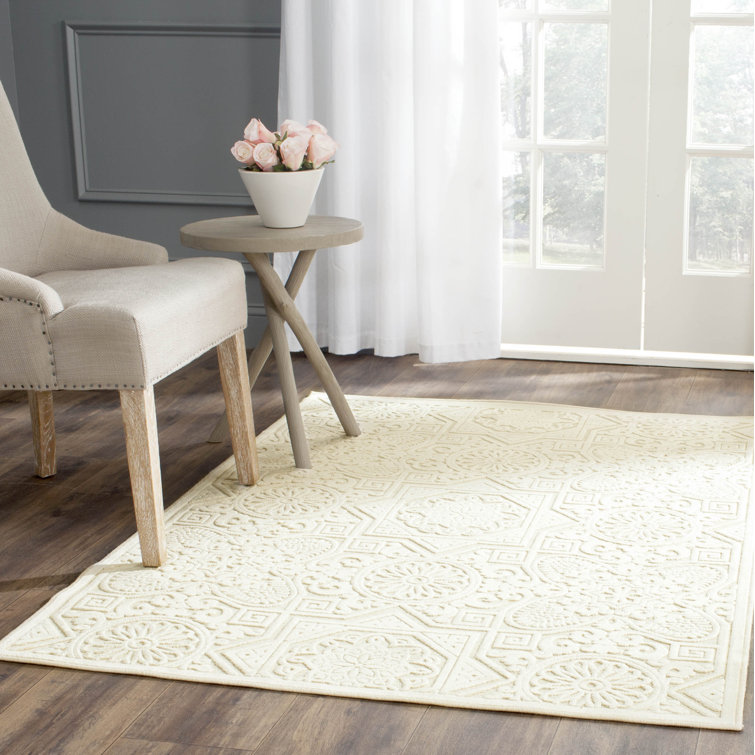 Handmade Tufted Creme Wool and Viscose Area Rug
