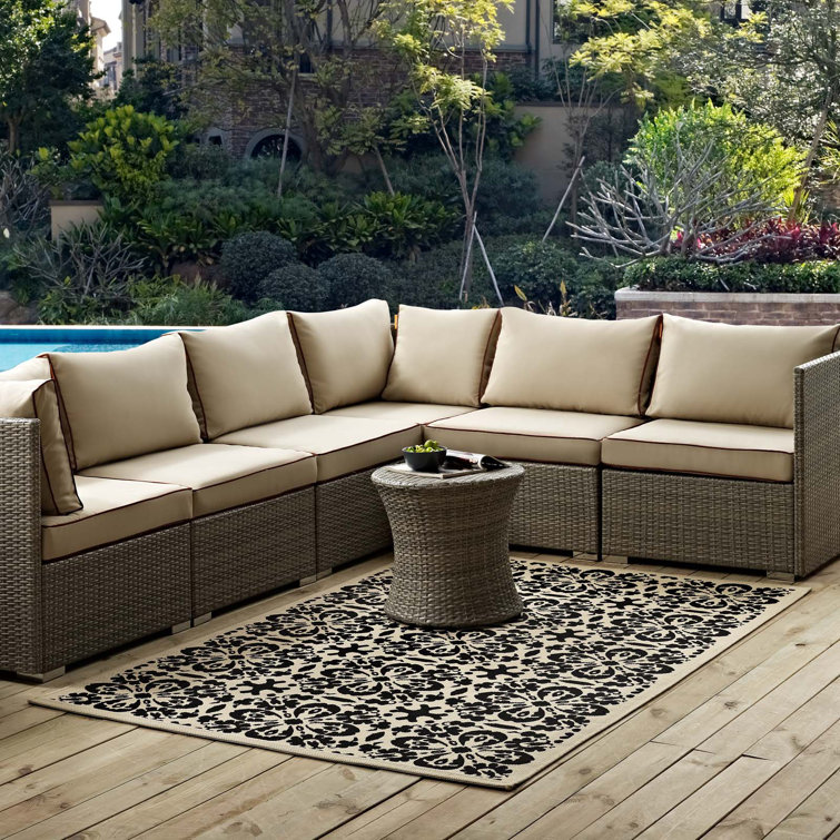 Ariana Black and Beige Floral Synthetic Area Rug