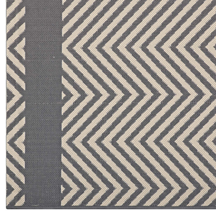 Gray and Beige 5' x 8' Synthetic Geometric Area Rug