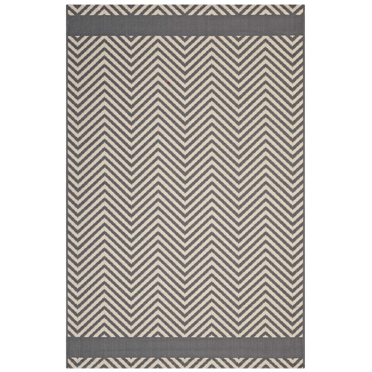 Gray and Beige 5' x 8' Synthetic Geometric Area Rug