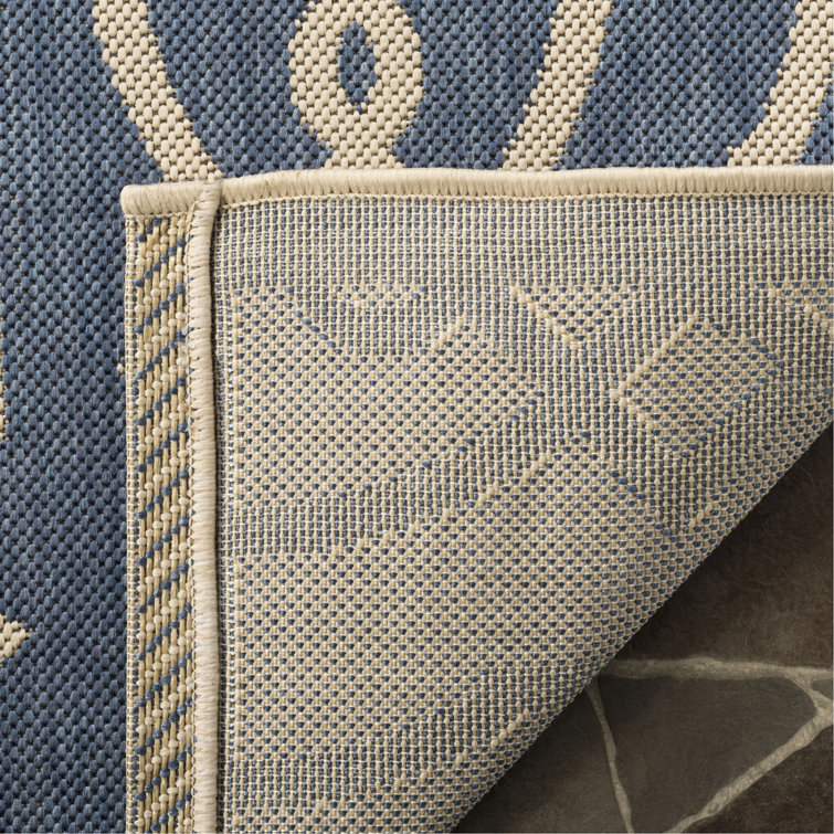 Handmade Reversible Blue Synthetic 5' x 7' Rectangular Rug
