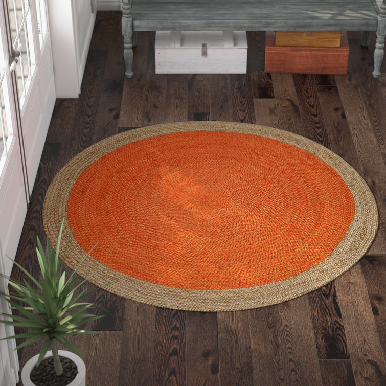Handmade Round Orange and Natural Jute Braided Rug, 4' Diameter