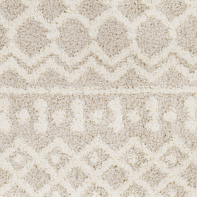 Round Beige and White Geometric Synthetic Area Rug