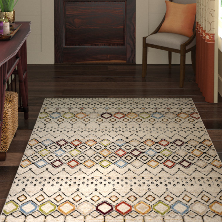 Ivory and Multi Geometric 5' x 7' Synthetic Easy Care Rug