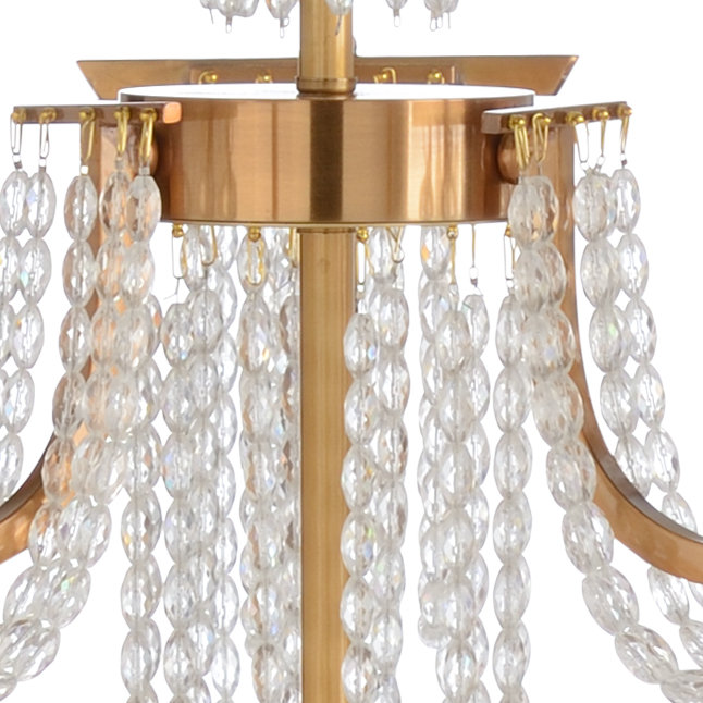 Mackie Antique Brass 9-Light Tiered Chandelier with Ecru Linen Shade