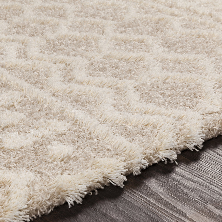 Round Beige and White Geometric Synthetic Area Rug