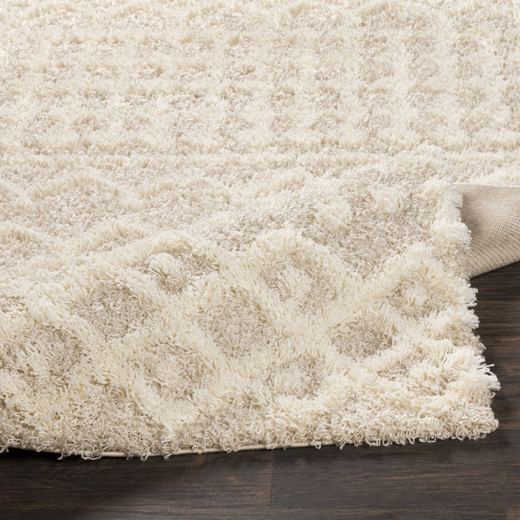Round Beige and White Geometric Synthetic Area Rug