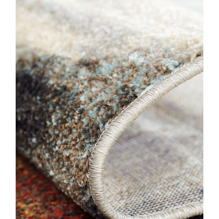 Ivory and Red Abstract Synthetic Rectangular Area Rug
