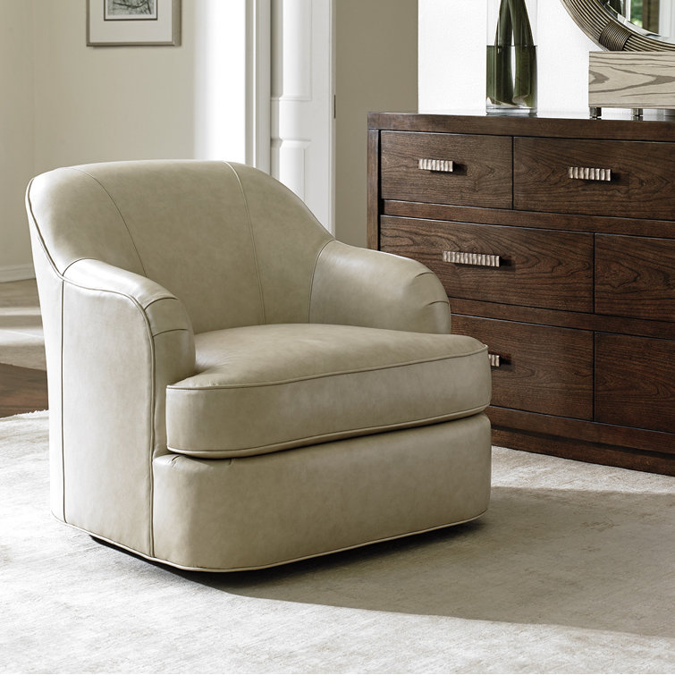 Sophisticated Gray Leather Swivel Armchair with Mahogany Wood