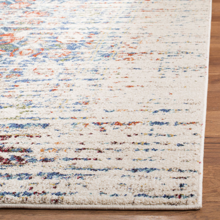 Ivory and Blue Synthetic Boho-Chic Area Rug