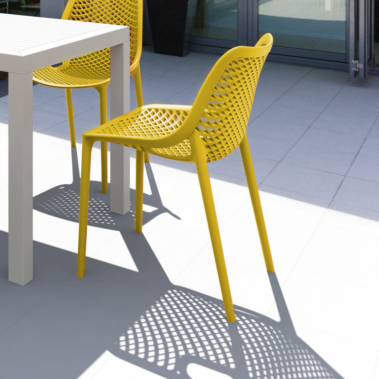 Yellow Stackable UV Resistant Plastic Outdoor Dining Chairs, Set of 2
