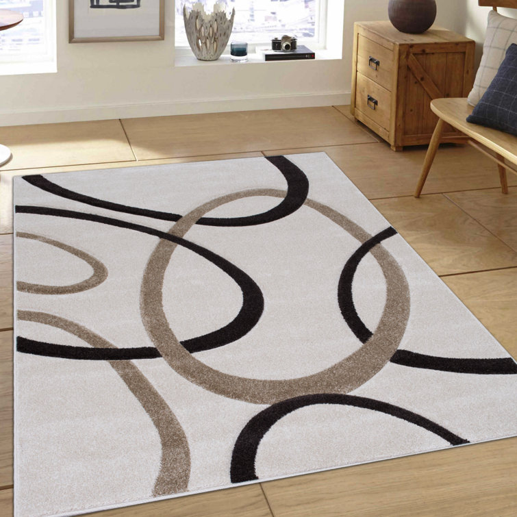 Ivory and Brown Abstract Synthetic Stain-Resistant 5' x 7' Rug