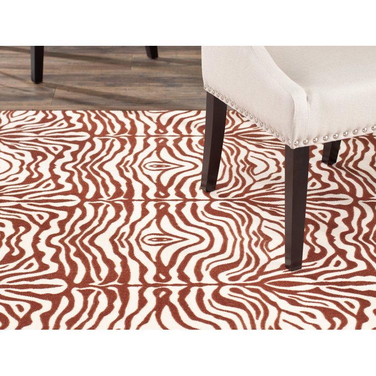 Metropolis Cream and Brown Animal Print Synthetic Rug